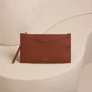 Brand new cognac wristlet from Polene - color discontinued!